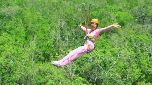 Benefit cheat who claimed anxiety left her housebound caught ziplining and surfing in Mexico