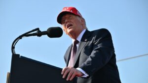 DOJ, in reversal, will continue its fight against law firms targeted by Trump